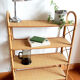 Rattan shelf on feet, vintage work 1960