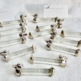 12 silver-plated metal duck knife rests with crystal.