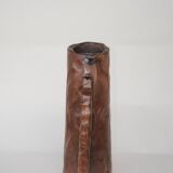 carved wooden pitcher