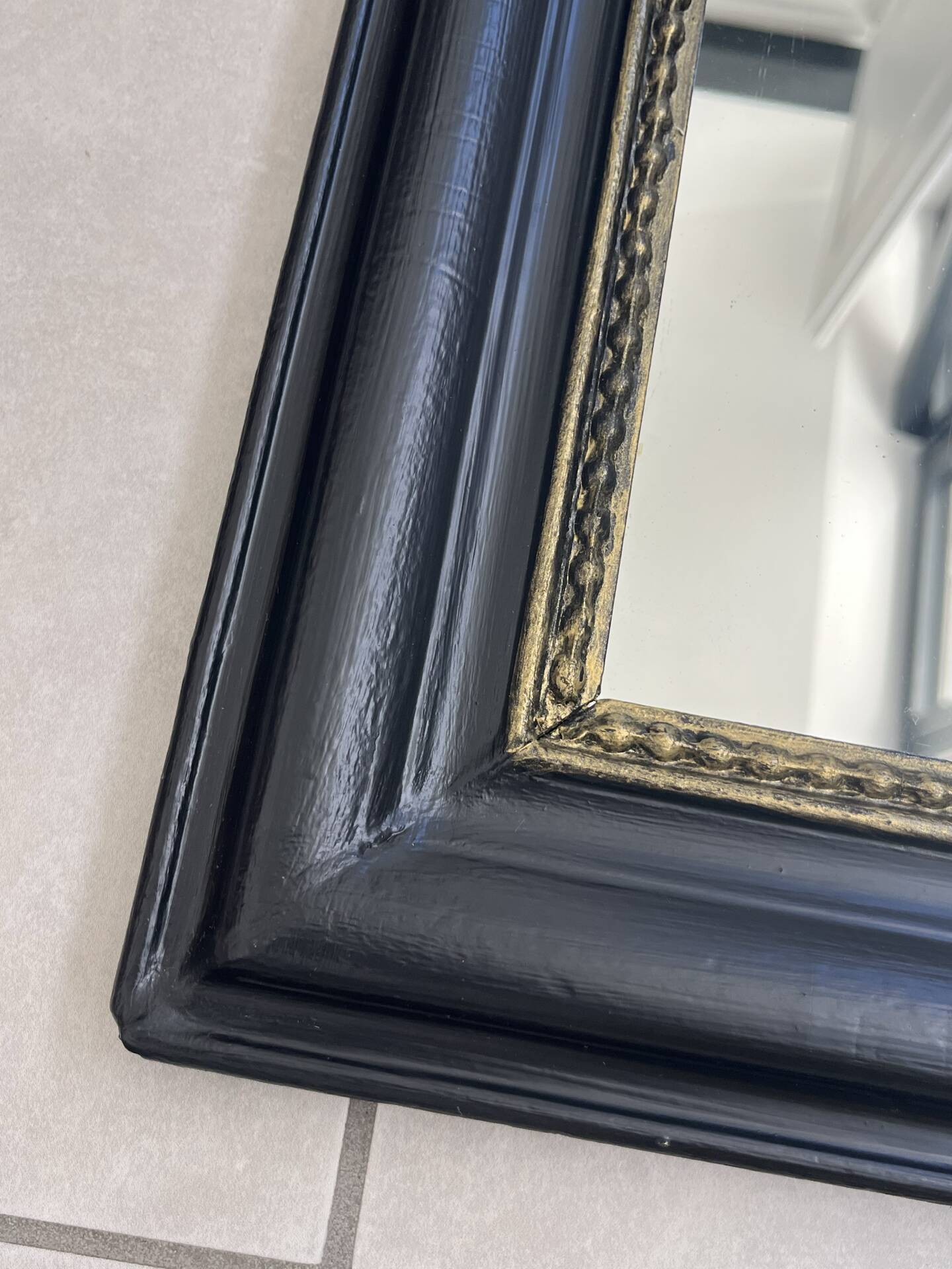Louis Philippe mirror in black and gold