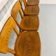 Set of 4 vintage solid oak chairs, 1960s design with sculpted backrest.