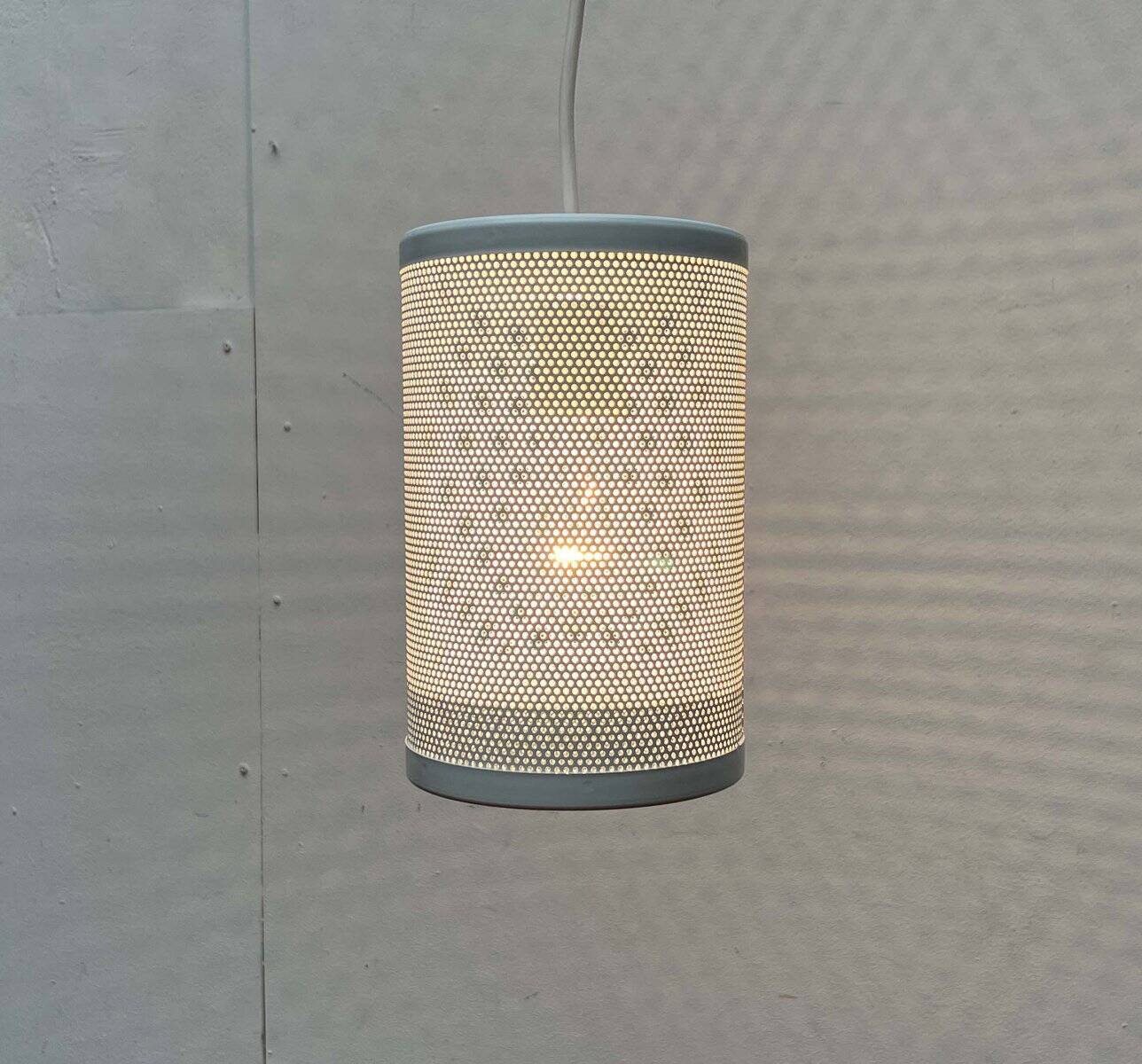 Minimalist perforated metal pendant lamp by Orno, Finland.