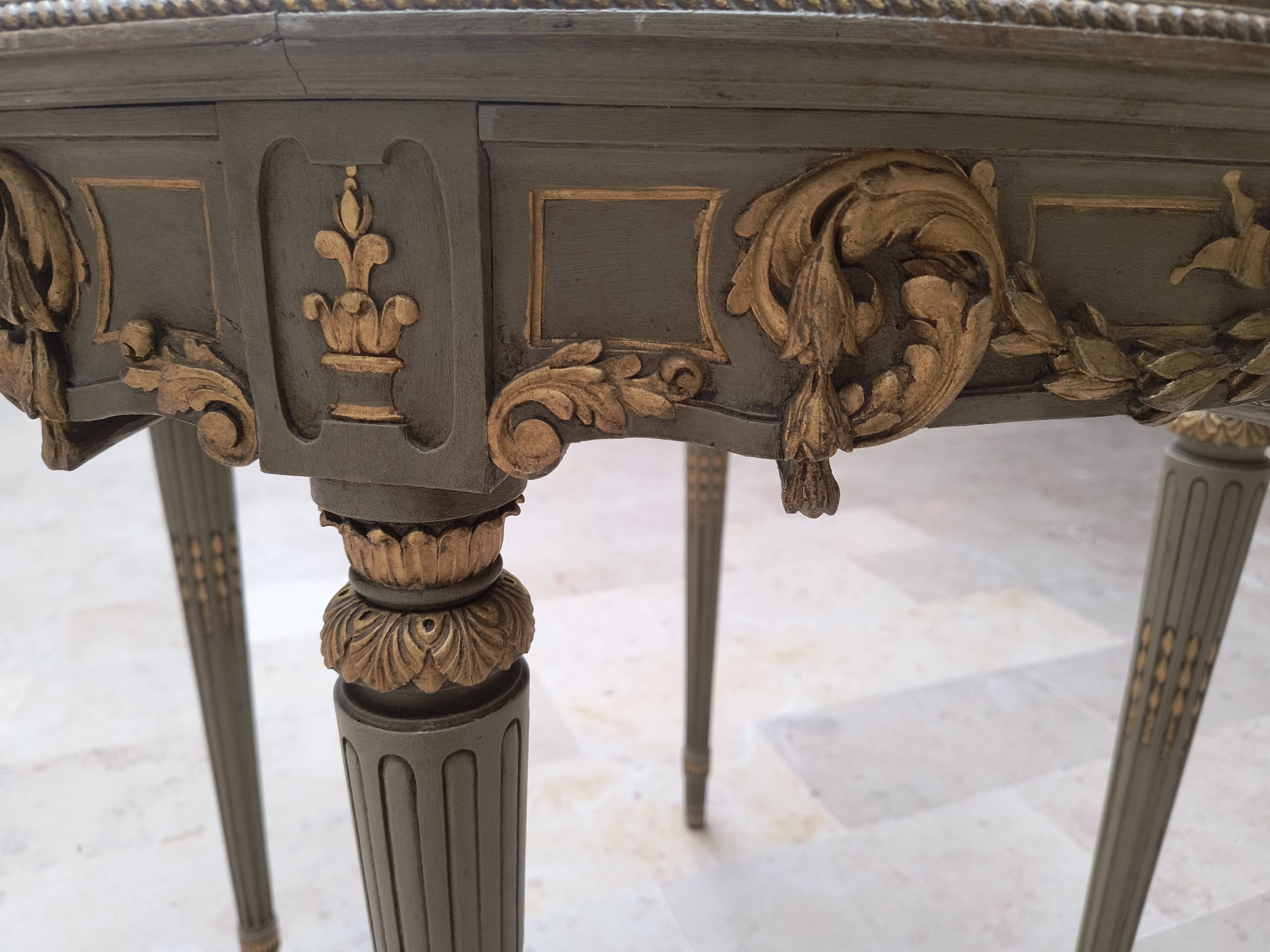 Louis XVI table with carved wood and Carrara marble.