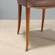 1950s chairs with wooden backs.