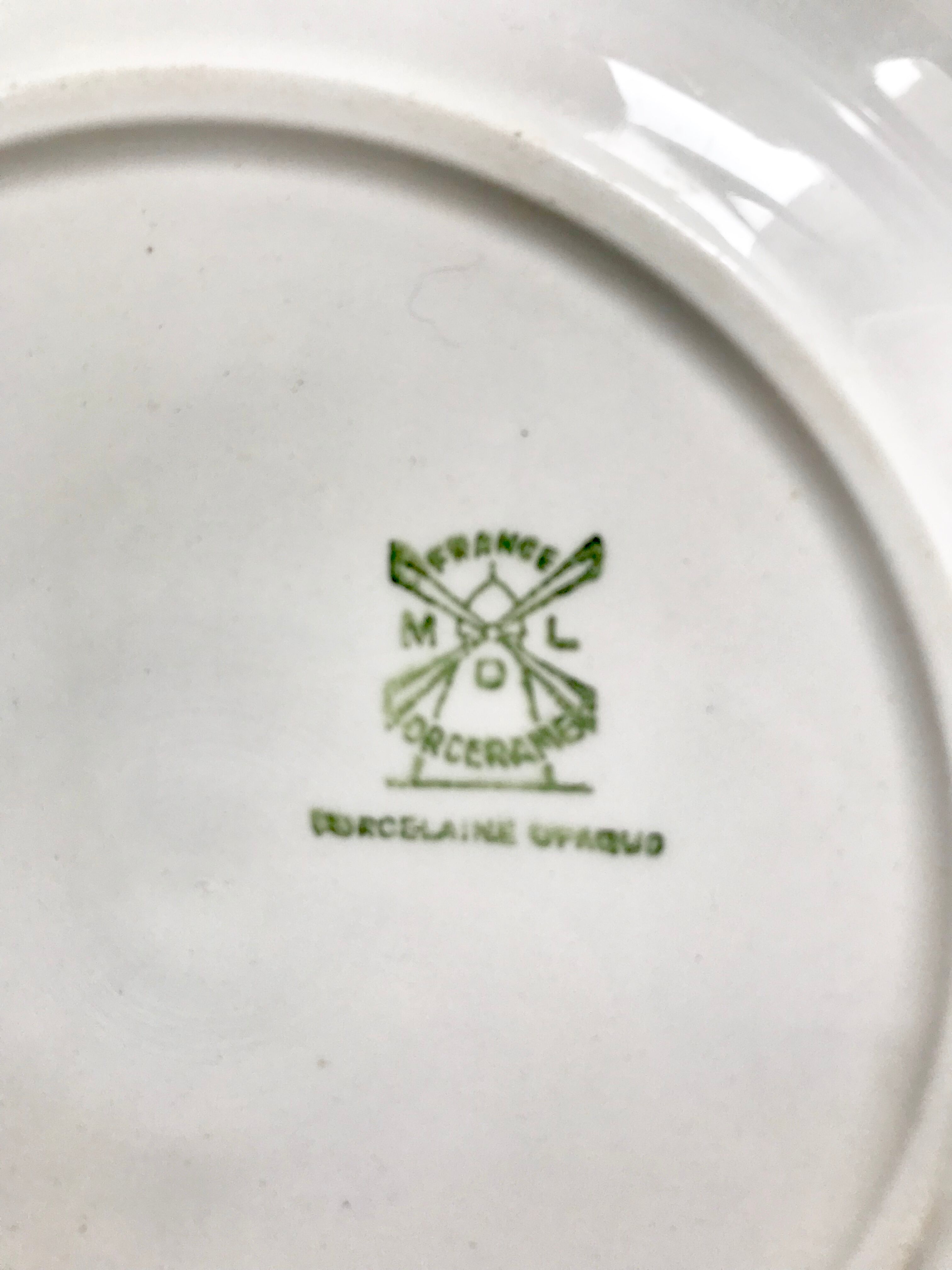 Four antique plates in fine white earthenware Moulin des Loups