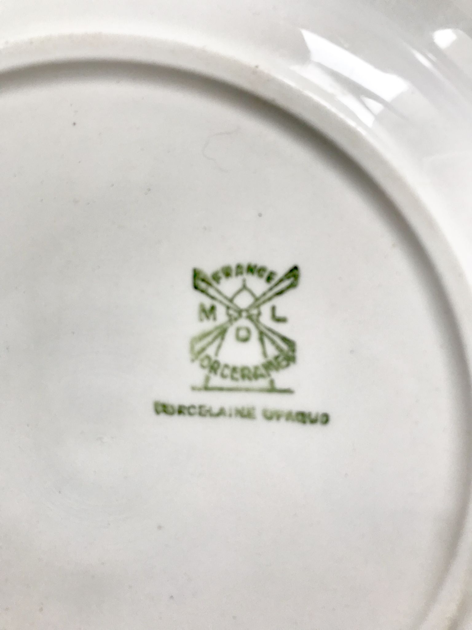 Four antique plates in fine white earthenware Moulin des Loups