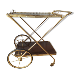 Rolling service in formica and gilded metal