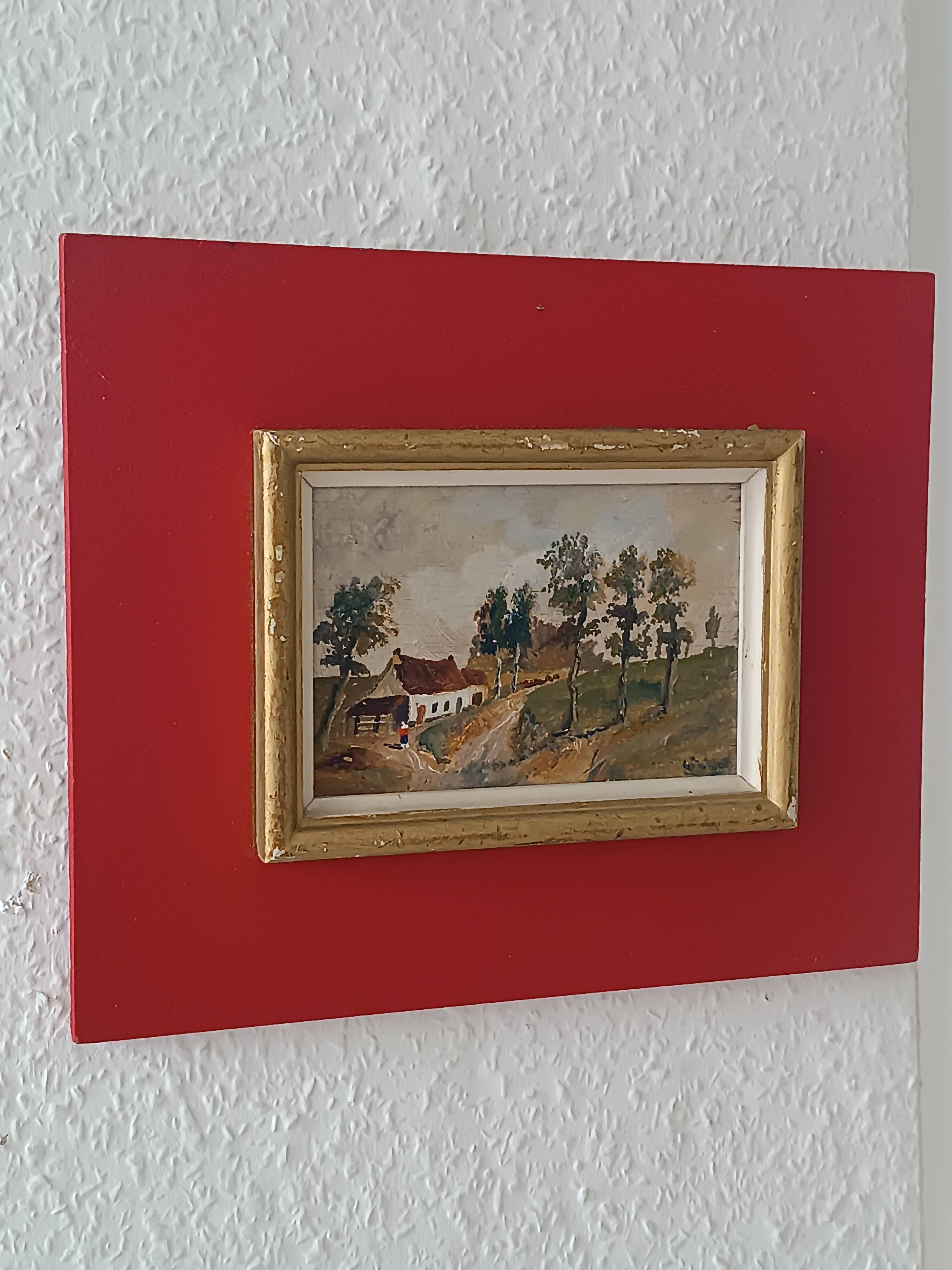Framed oil on panel of an old countryside landscape.