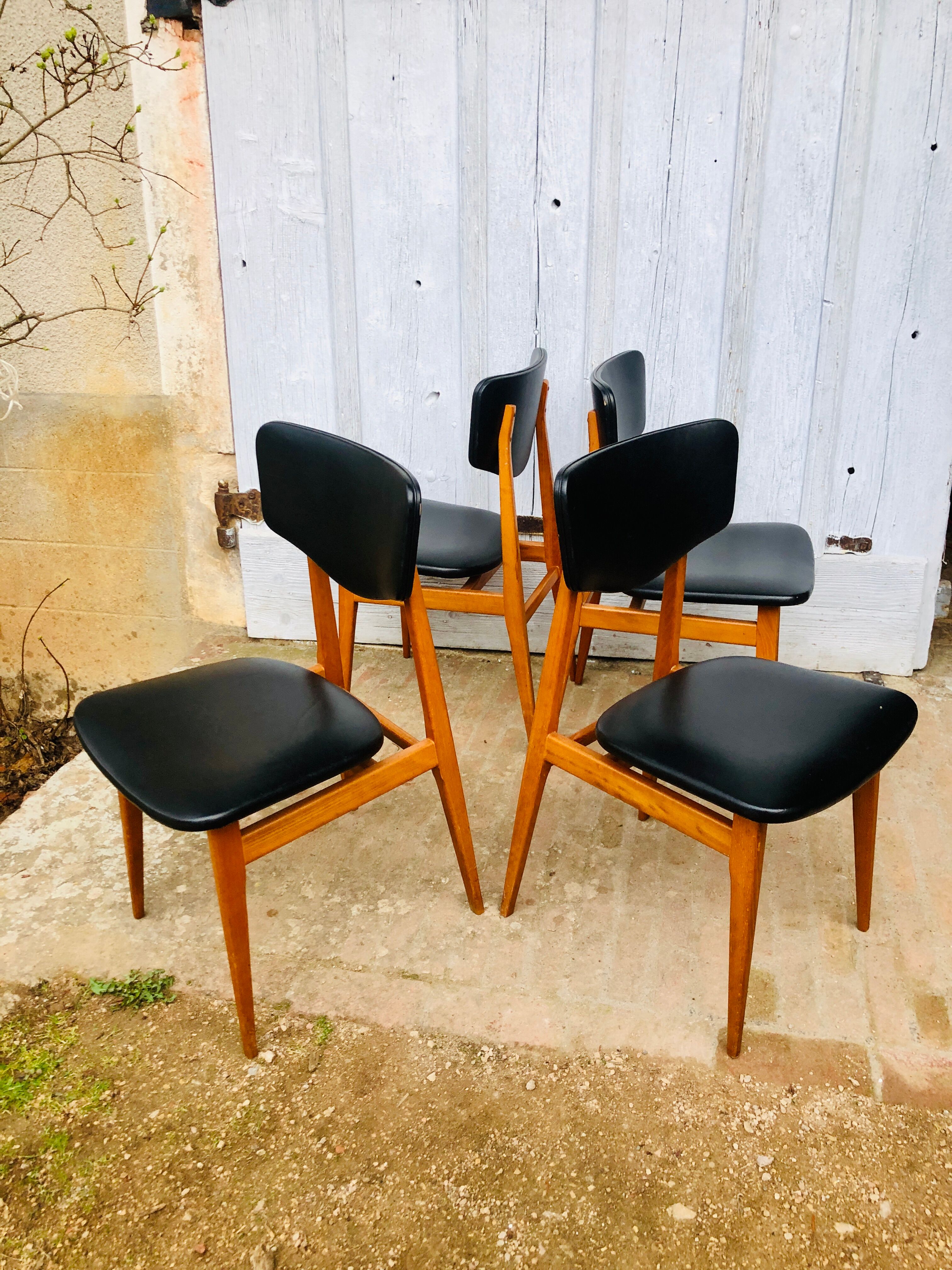 Set of 4 Scandinavian teak and black skai chairs
