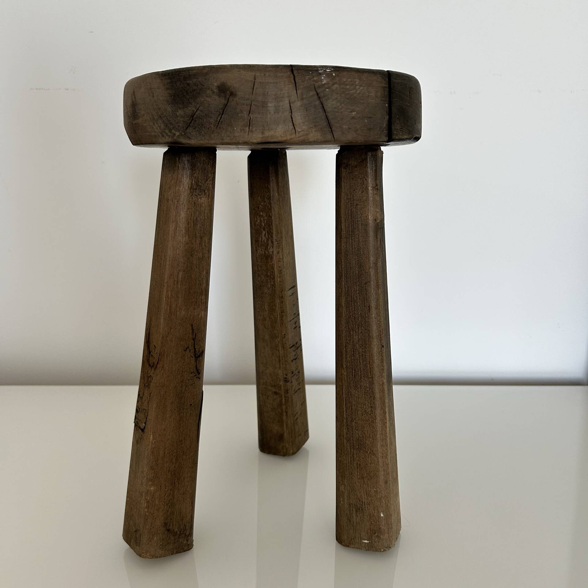 Patinated tripod stool
