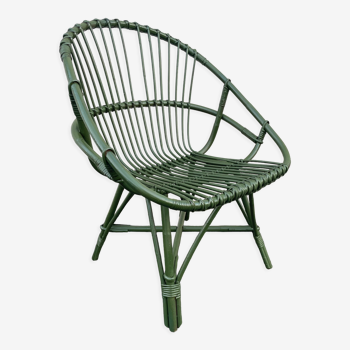 Green rattan armchair