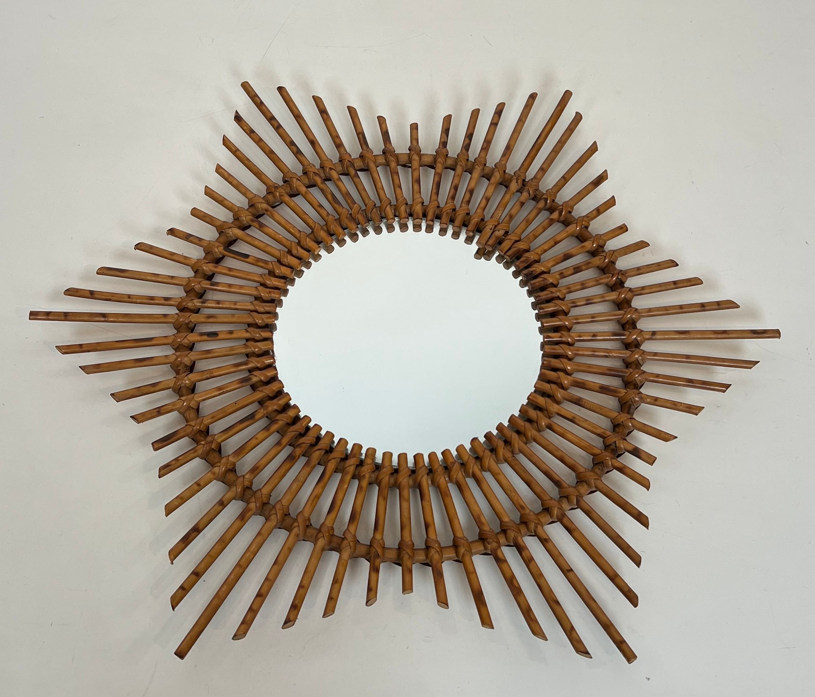 Rattan mirror in the shape of a star.