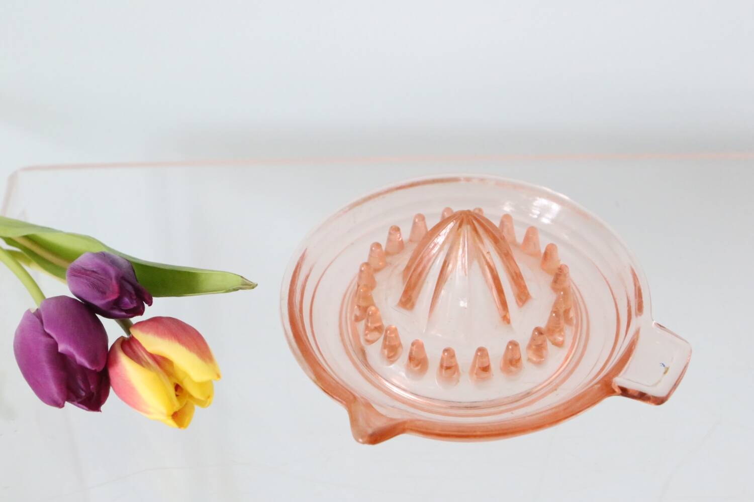 Adorable pink glass juicer
