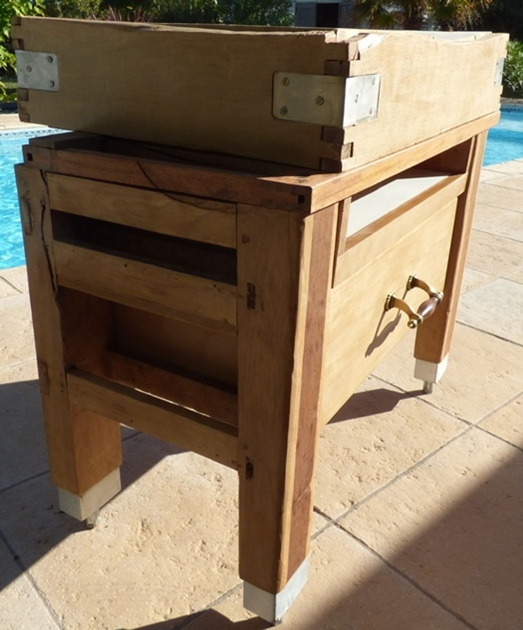 Butcher's log cabinet with two drawers and location for kitchen utensils