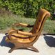 Fauteuils en bois et cuir capitonné, les 2