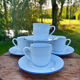 Ensemble de 4 tasses à café et soucoupes blanches liseré bleu degrenne