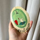 Old enameled plaque “Bathroom”