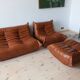 Ensemble Togo de canapé 2 places, fauteuil et pouf en cuir marron whiskey.