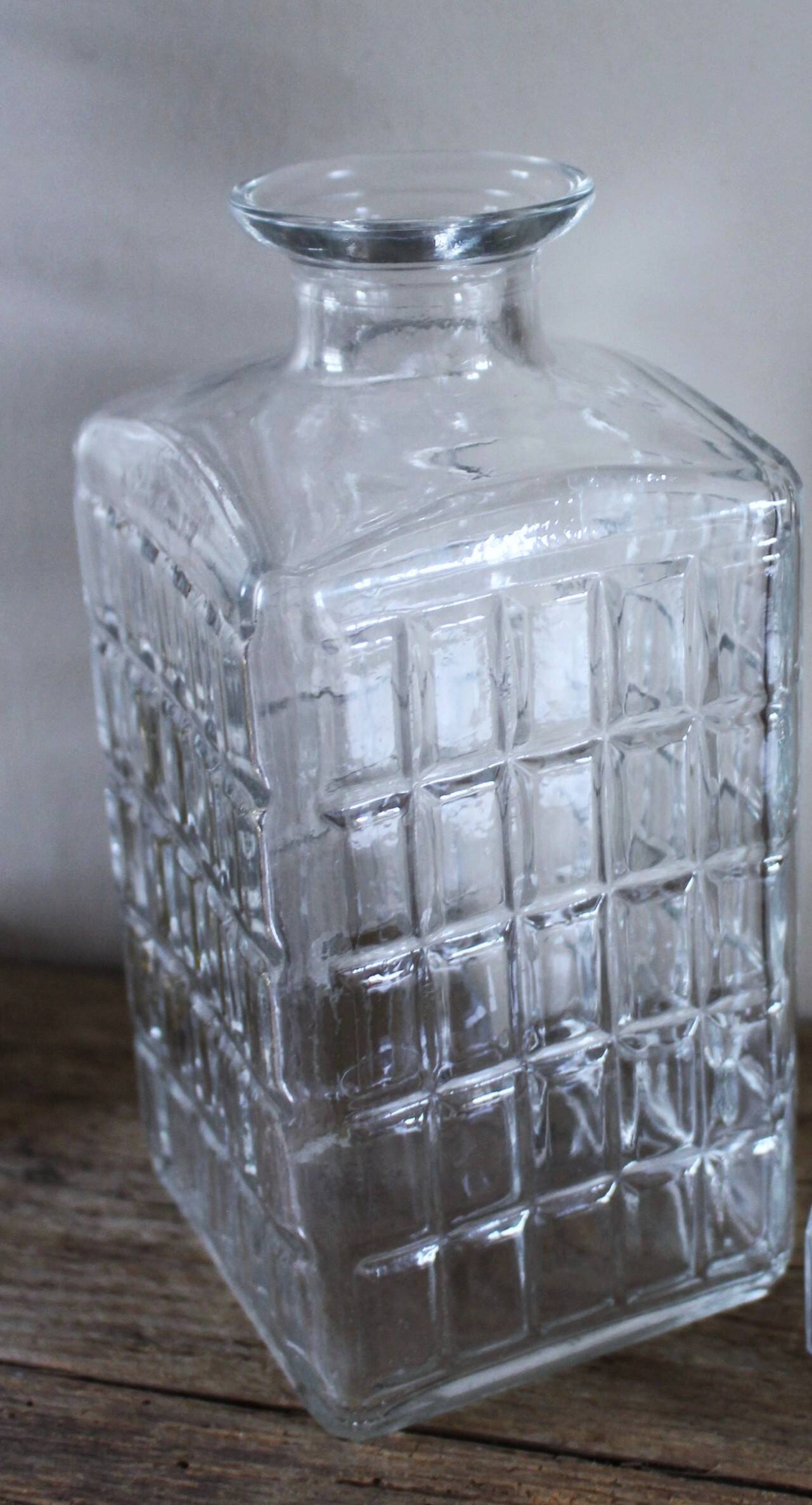 Vintage glass water carafe with rectangular vase.