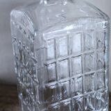 Vintage glass water carafe with rectangular vase.