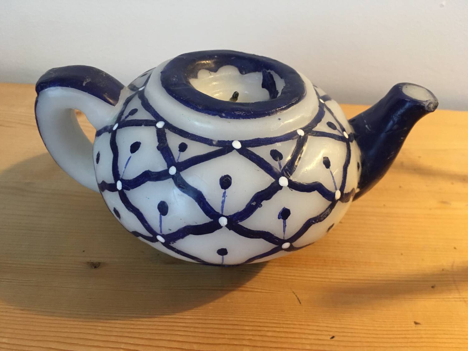 Vintage teapot shaped candle.