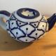 Vintage teapot shaped candle.