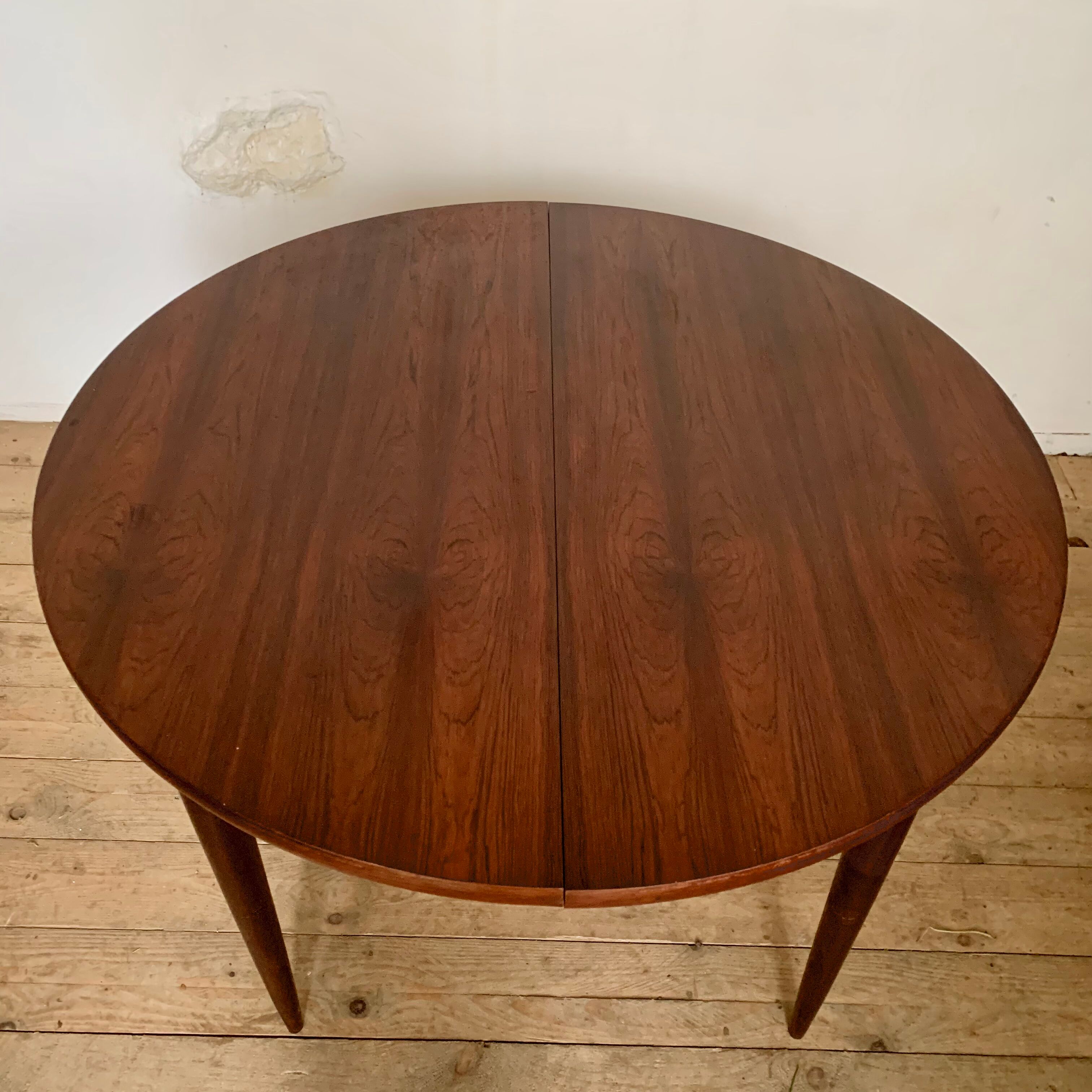 Vintage Scandinavian round table in Rio rosewood