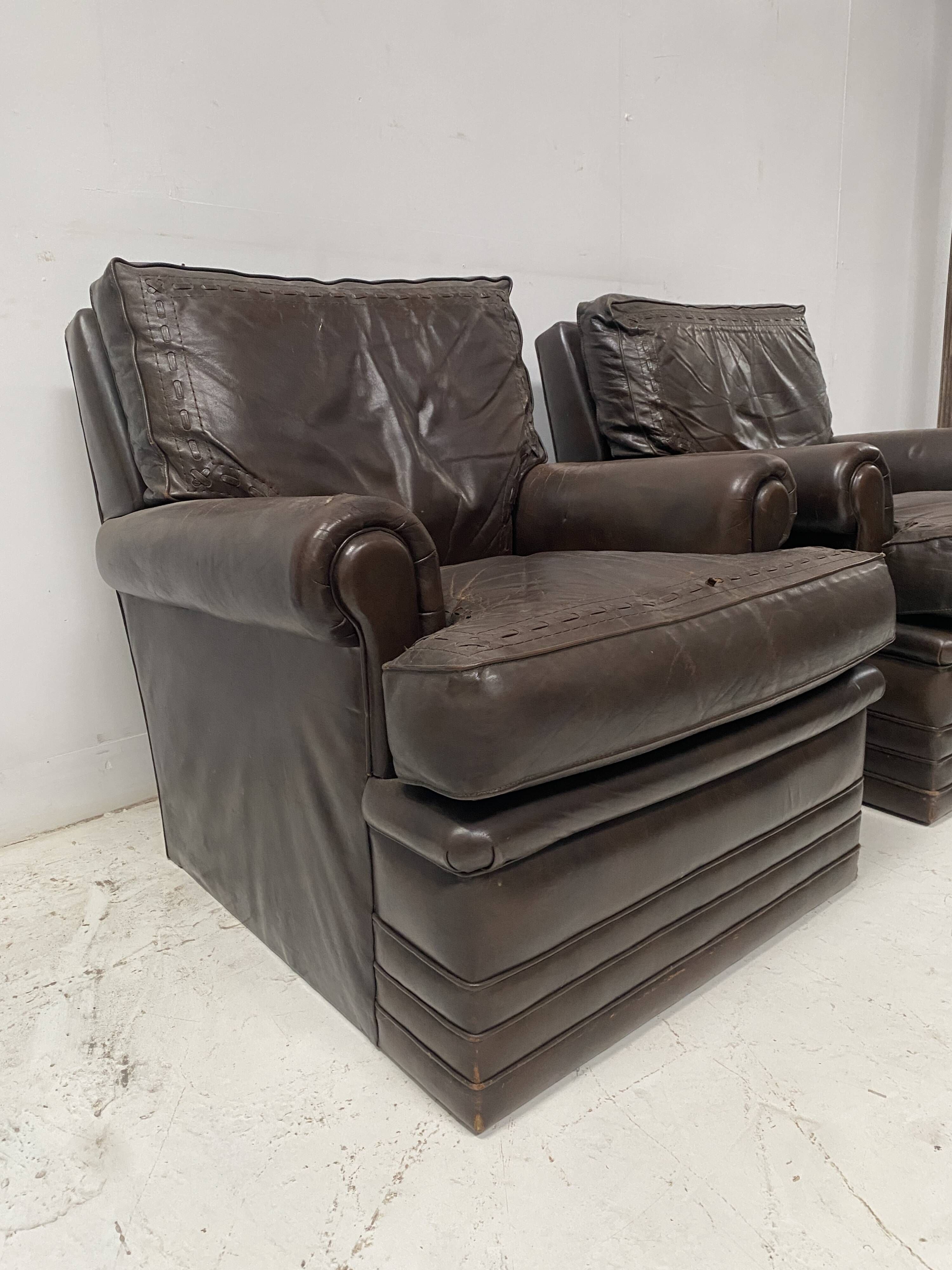 Pair of vintage brown leather armchairs from the 1970s.