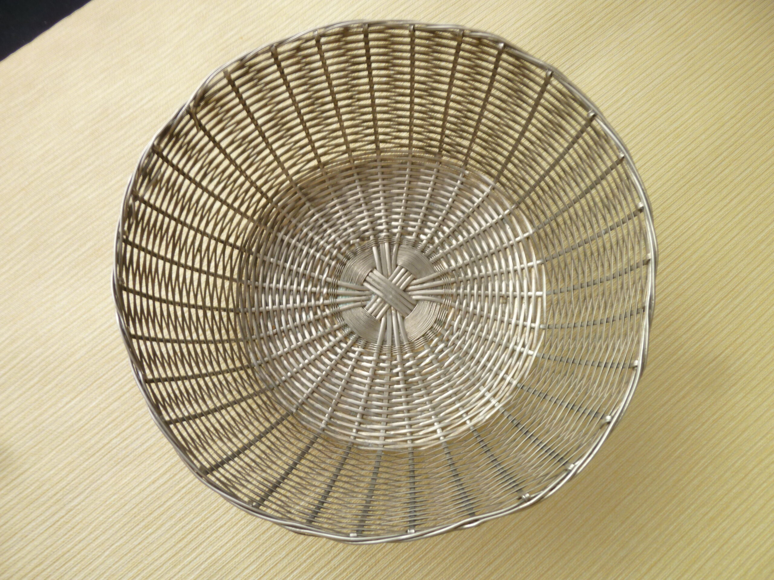 Weaving silver metal wire basket or basket