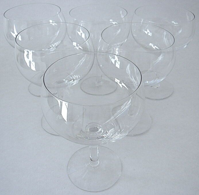 Suite of six beer glasses on foot in colorless crystal