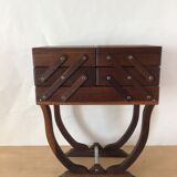 Worker on wooden feet