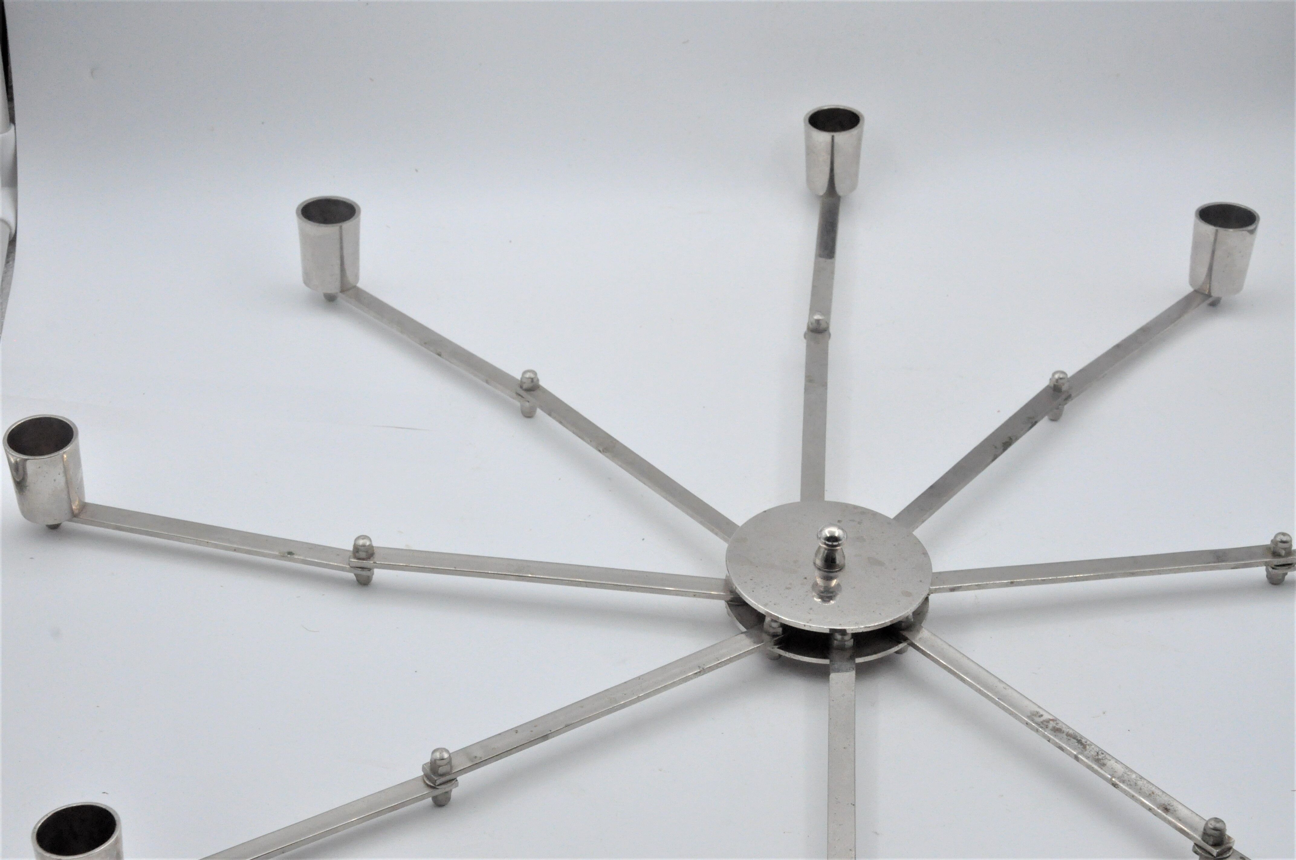 Design candle holder in silver metal, with 8 candles, modular spider