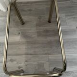 Pull-out tables in vintage smoked glass