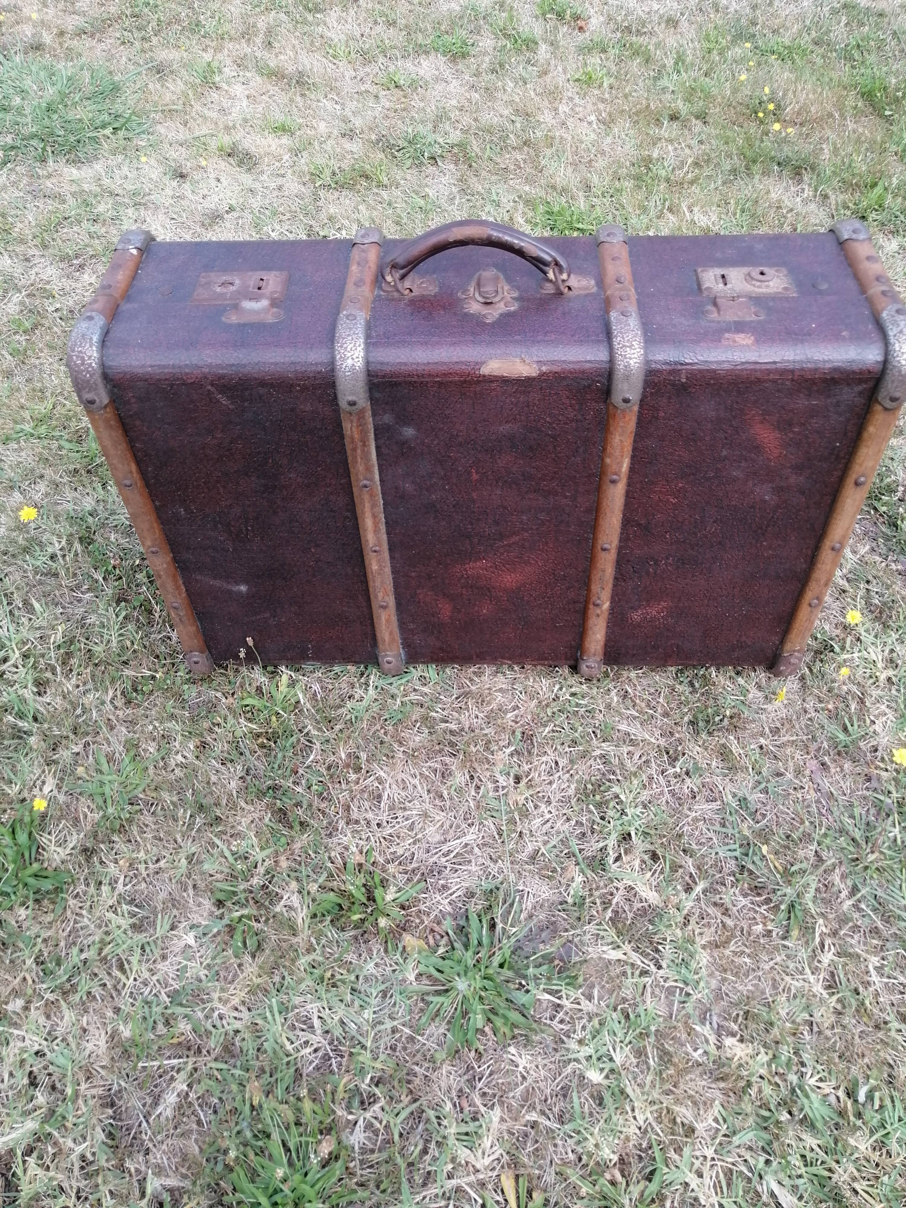 Antique suitcase in leather wood and vintage metal