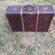 Antique suitcase in leather wood and vintage metal