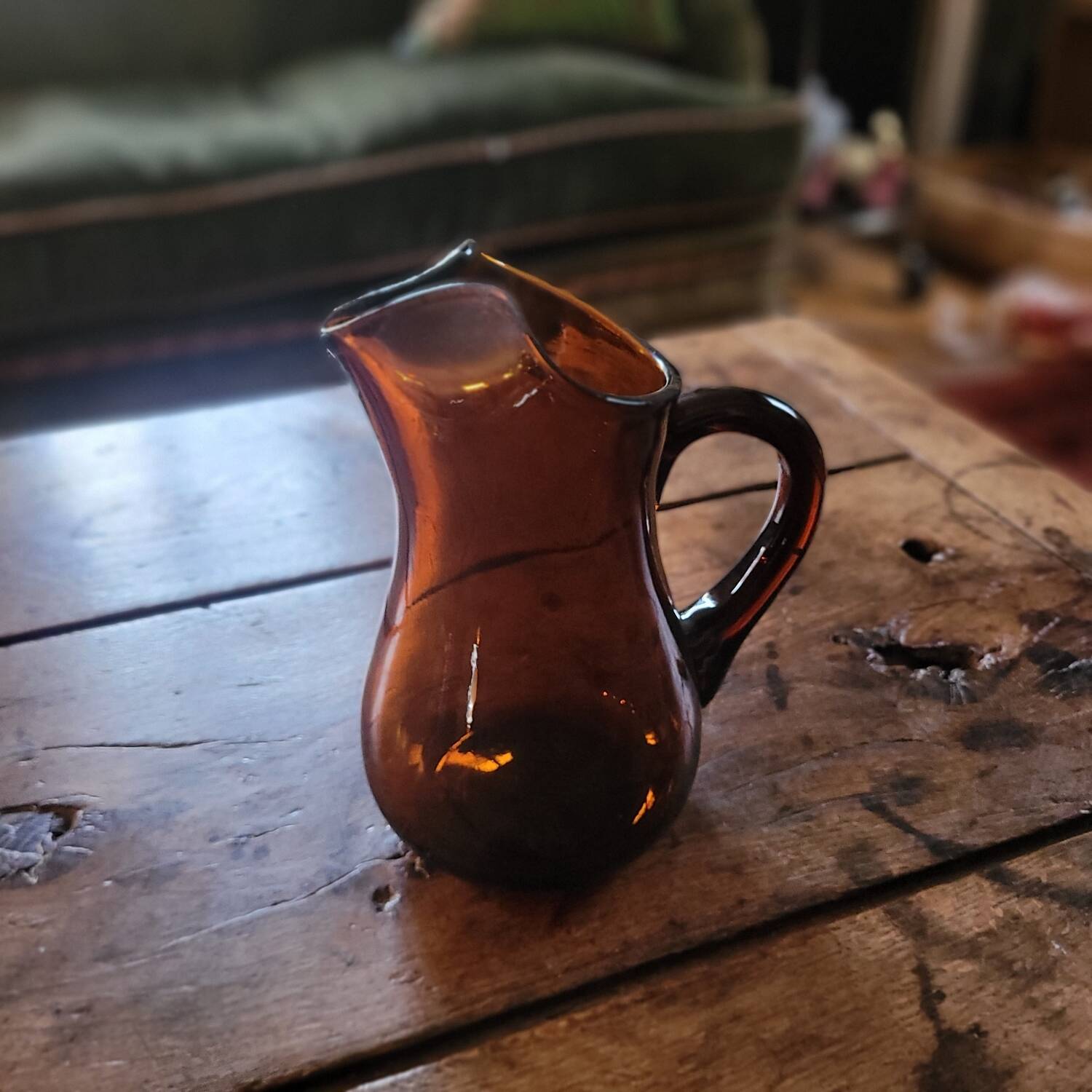 Dark amber glass pitcher – 1960s