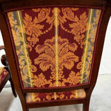 Pair of cross-back armchairs, Empire style, 19th century.