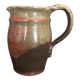 Ceramic pitcher from the 20th century with a signature to identify.