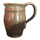 Ceramic pitcher from the 20th century with a signature to identify.