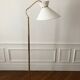 1950 floor lamp rises downwards in diabolo brass