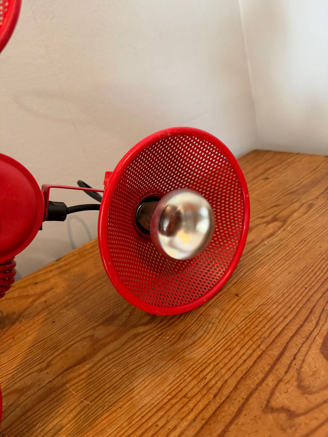 Three-lamp suspension in Memphis design style in red metal.