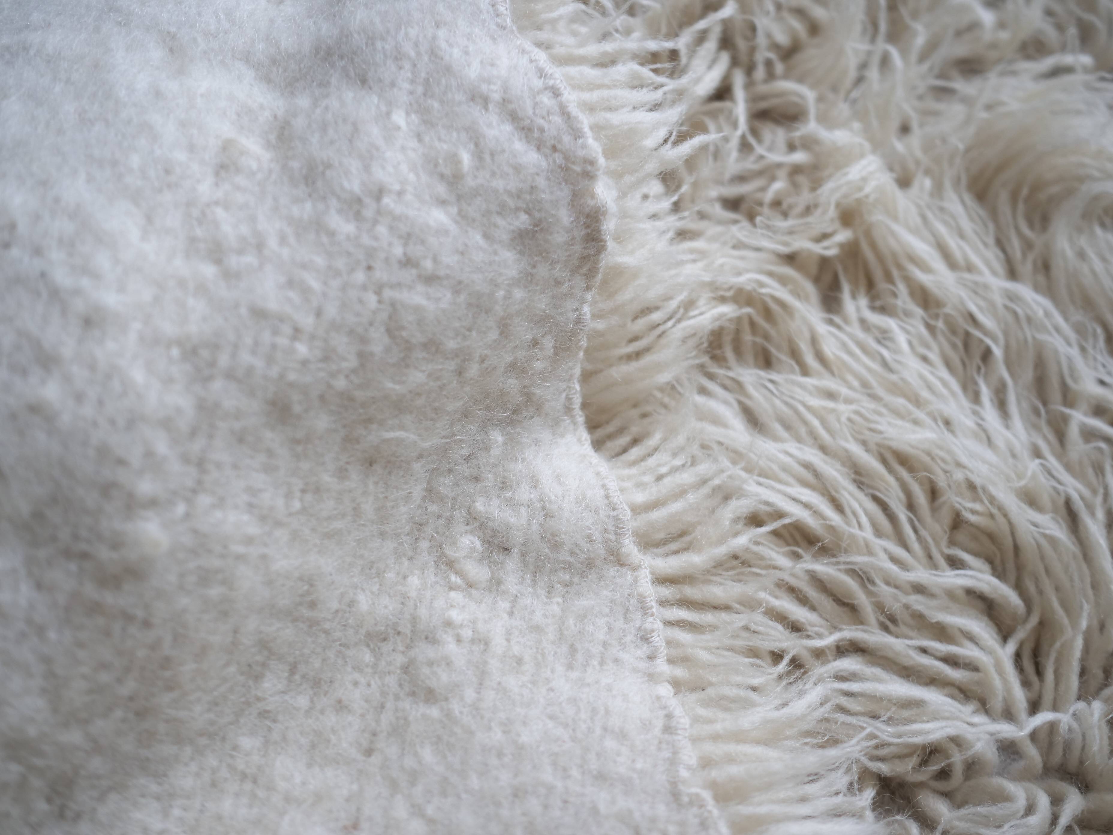 Vintage ecru natural wool round rug