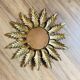 Golden metal sun mirror
