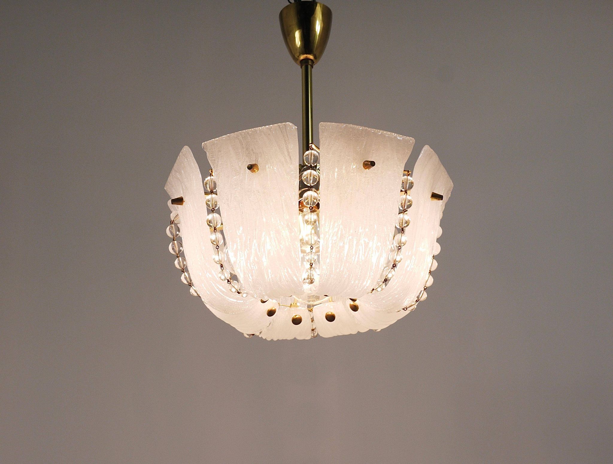 J.T. Kalmar Petite curved suspension basket, brass and glass, Austria, 1950s