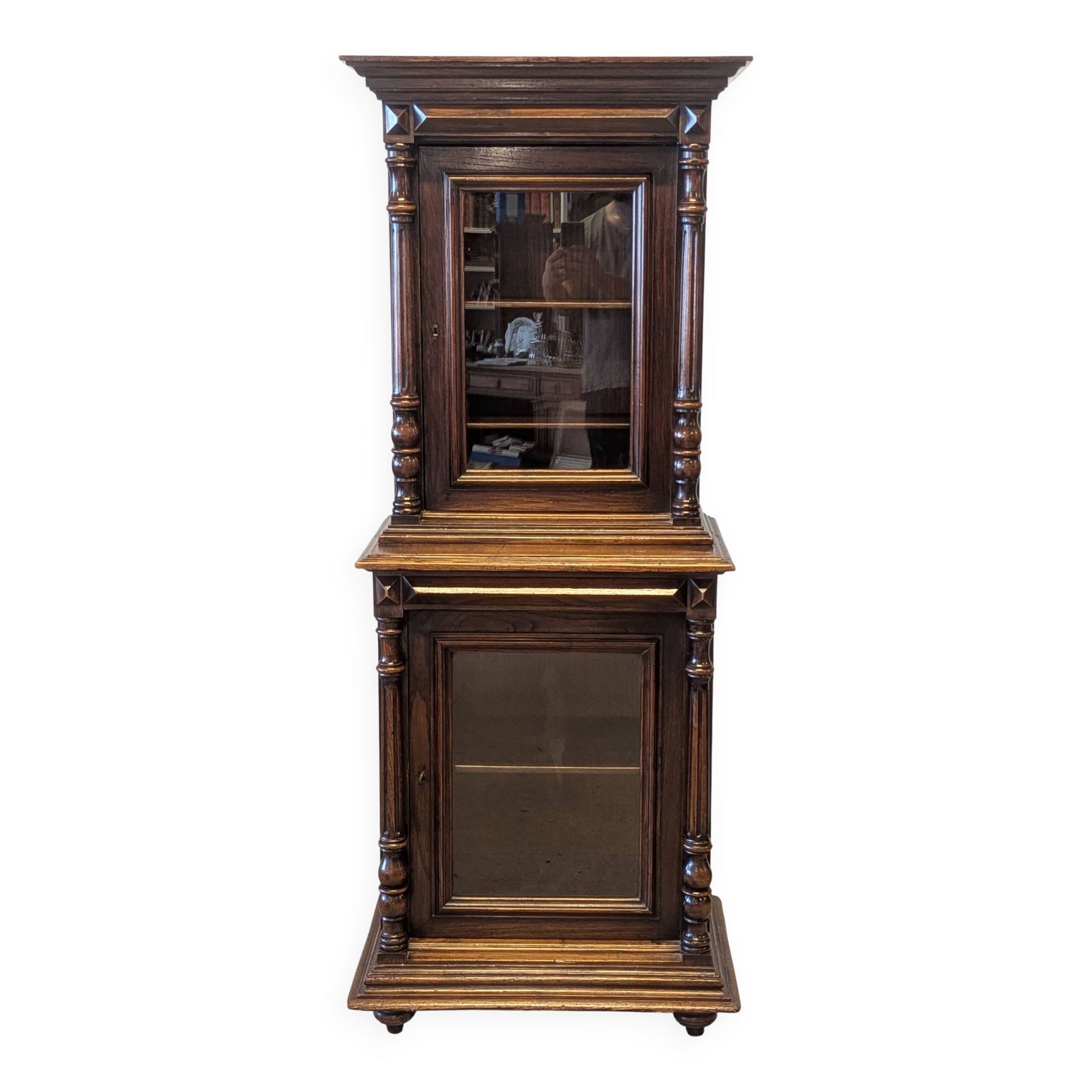 Two-body display cabinet in oak, Henri II style.