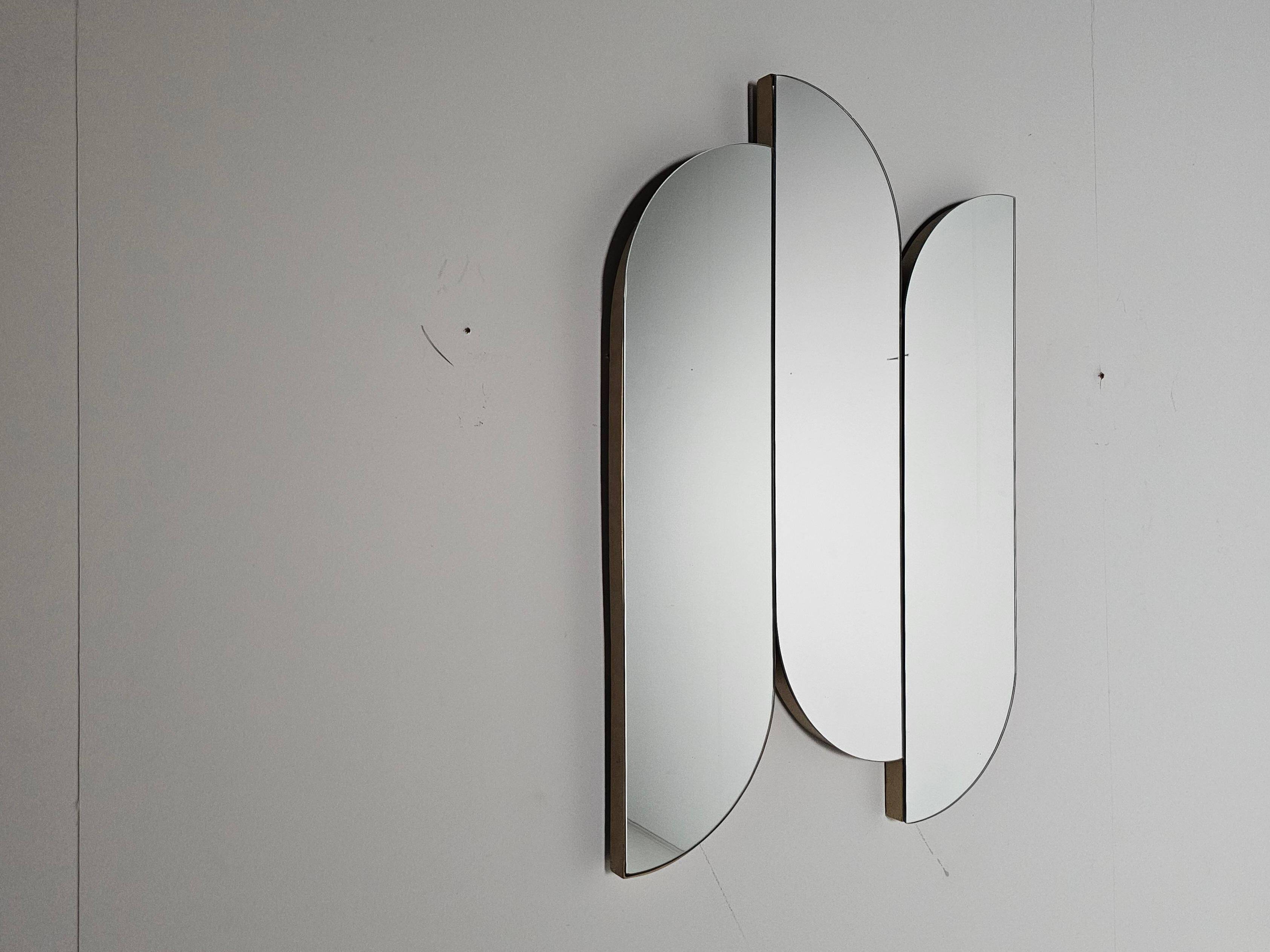 Sculptural wall mirror with brass edges, Italy, 1970s