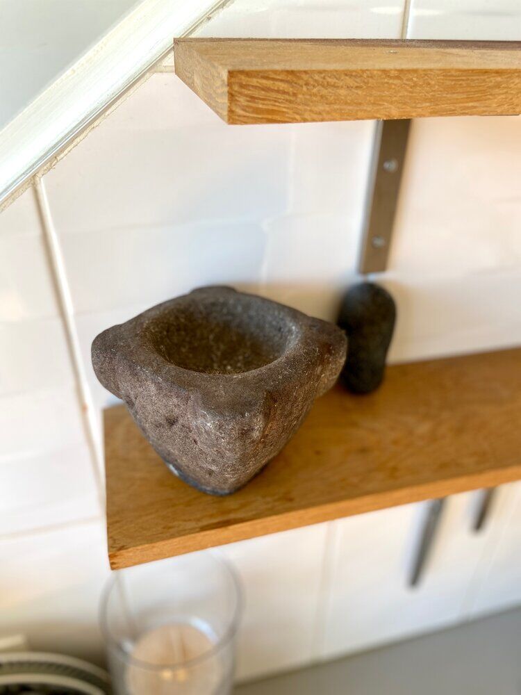 Mortar and pestle in black stone