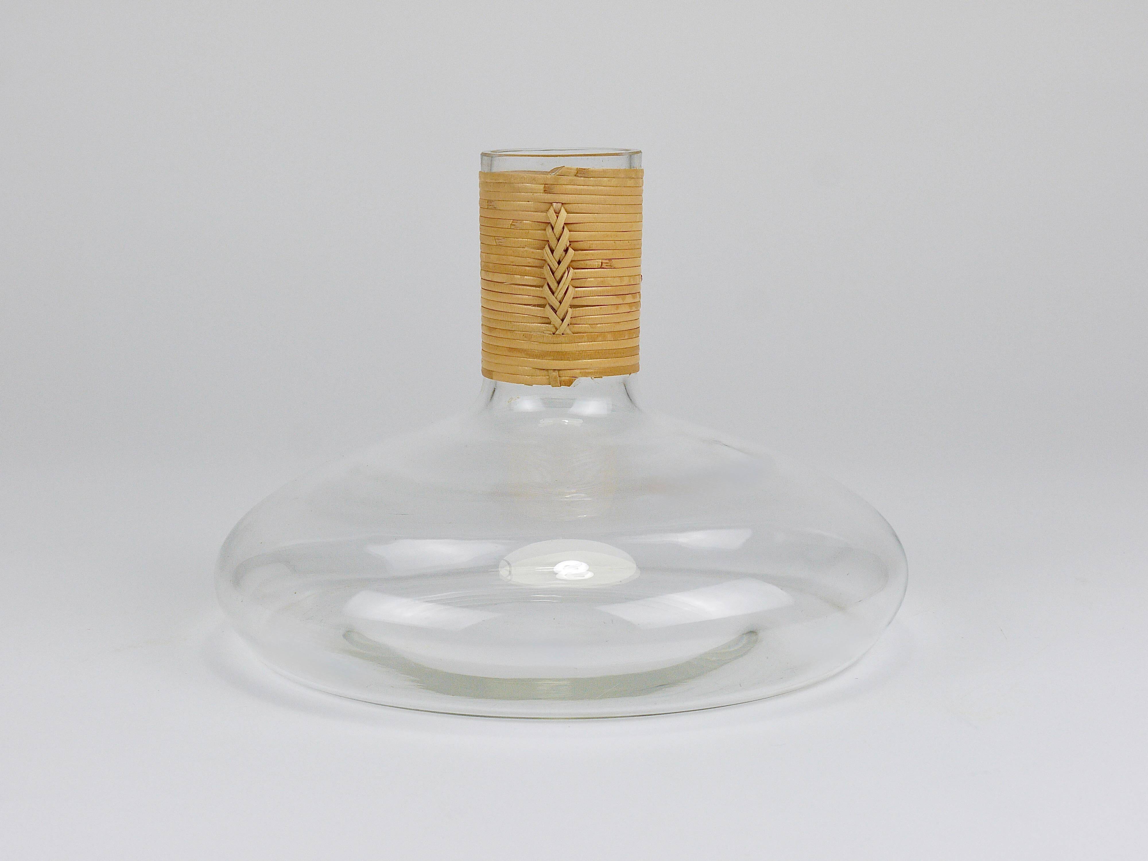 Vase by Carl Auböck decanter "Tuberkulinkolben" tall in rattan, Austria, 1950s.