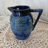 Antique pitcher in enamelled ceramic