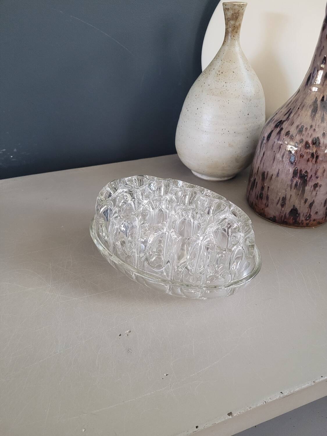 Large molded glass flower holder